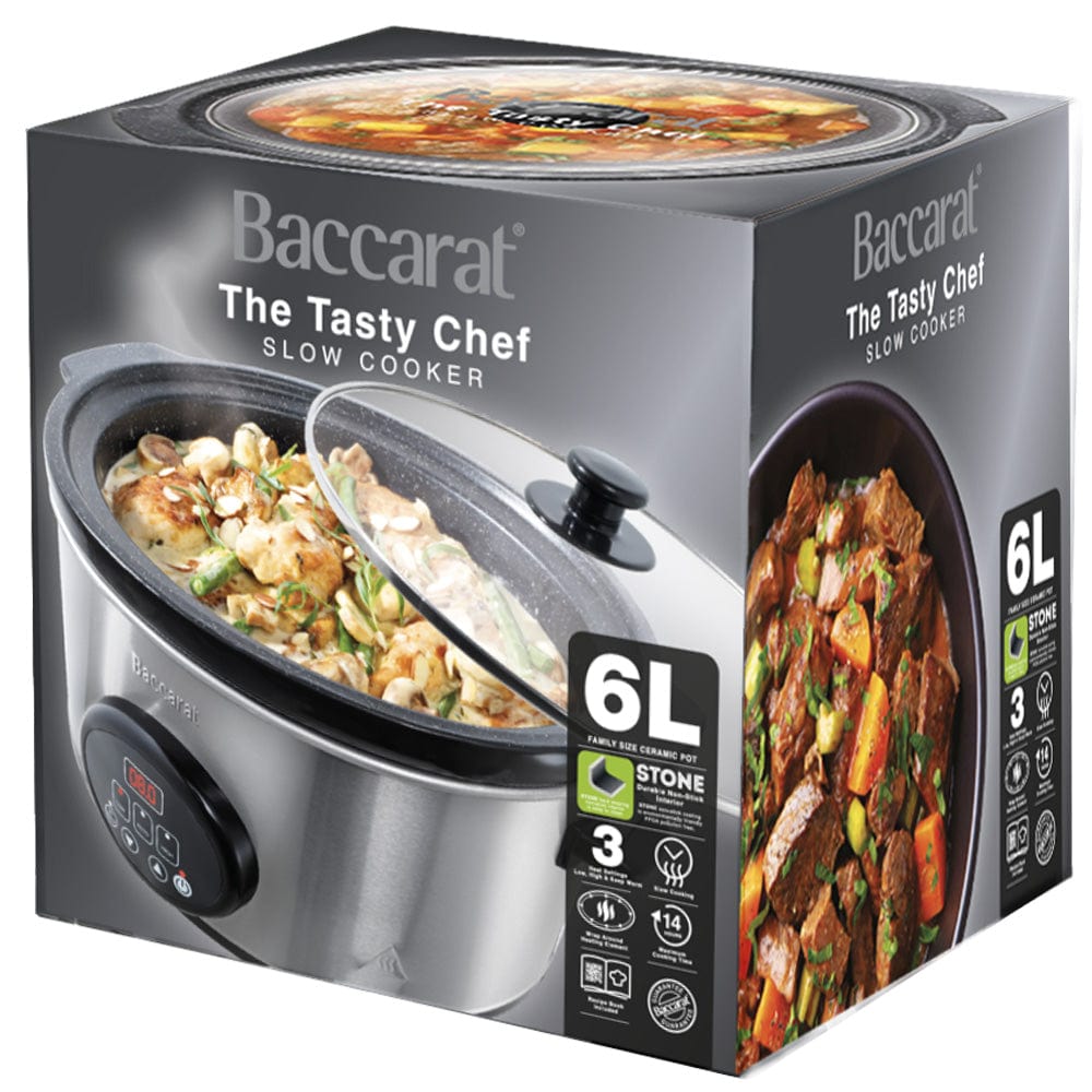 A vibrant orange creamy soup garnished with fresh parsley in a sleek bowl - Baccarat the Tasty Chef