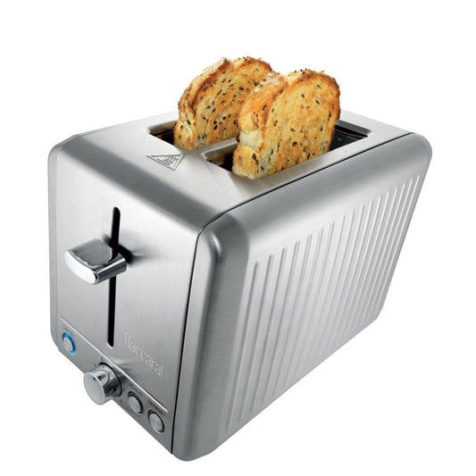A stylish toaster with golden toast and fresh fruit in a bright kitchen silver toaster - Baccarat